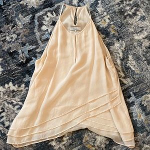 Cream tank top. Looks great